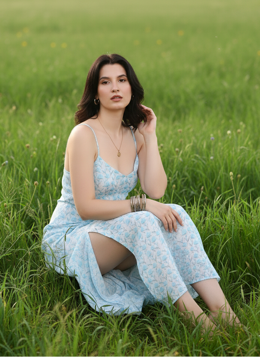 Close-up of blue print on long summer dress, vibrant modern design Moon N Lotus
