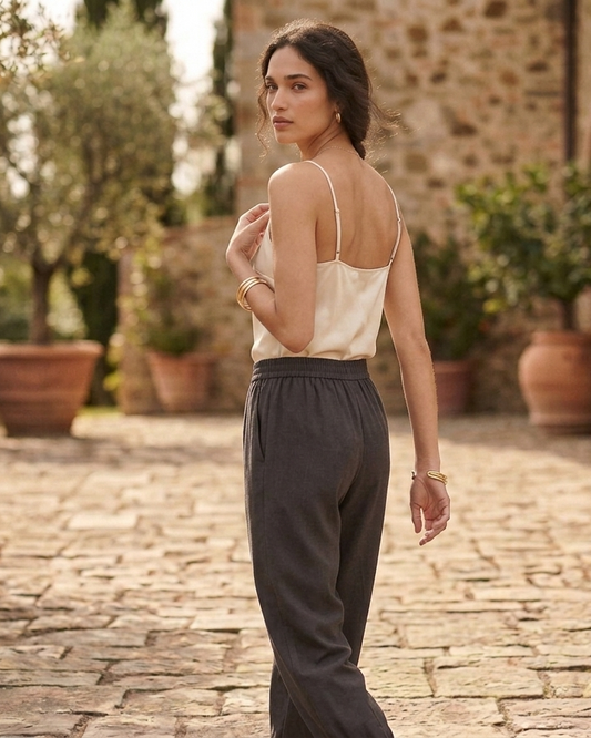 Back view of black jumper in rose fabric with relaxed structure Moon N Lotus