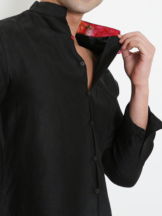 Close-up of mandarin collar on black bamboo shirt, minimal premium design Moon N Lotus