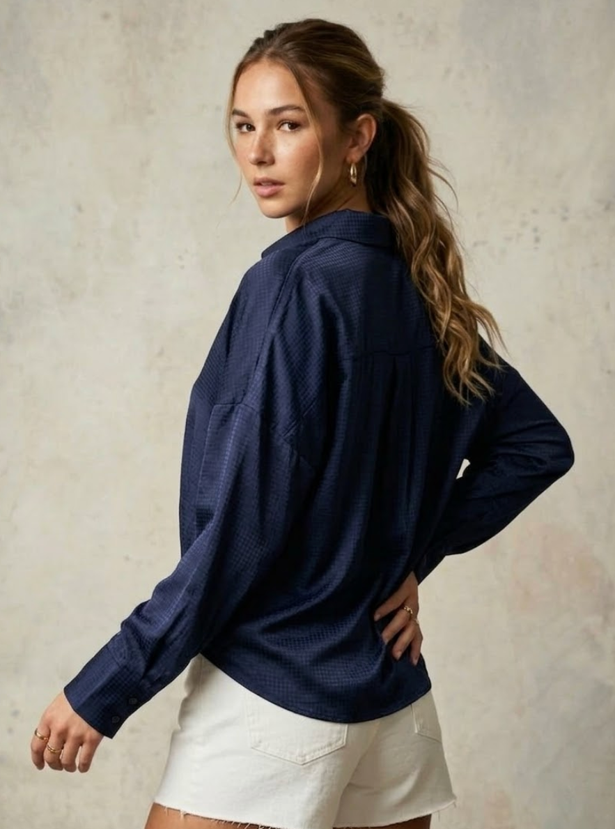 Back view of navy asymmetrical shirt in corn fabric, relaxed fit and elegant drape Moon N Lotus