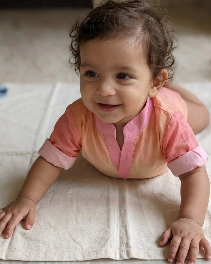 Front view of sky printed baby romper in rose fabric with tailored fit Moon N Lotus