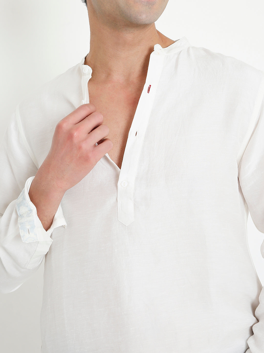 Close-up of bamboo fabric on white kurta shirt, soft breathable texture Moon N Lotus