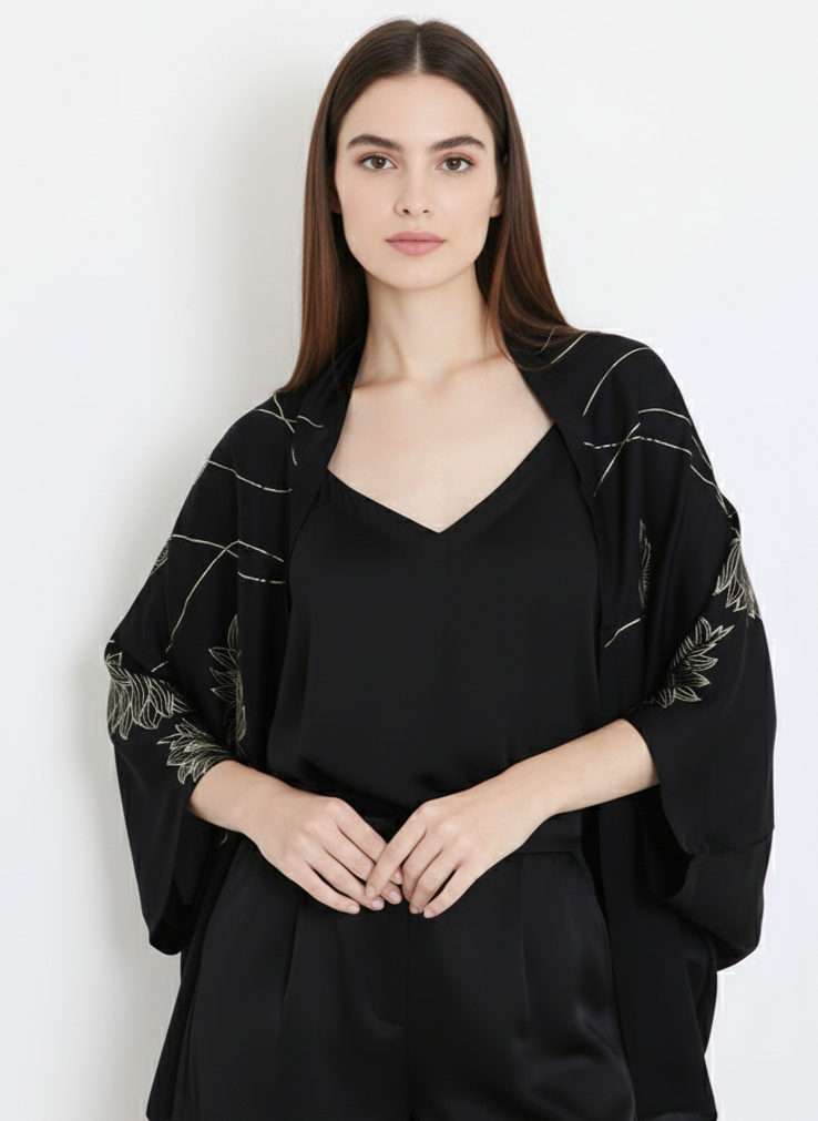 Front view of black shrug for women, lightweight zero waste design Moon N Lotus