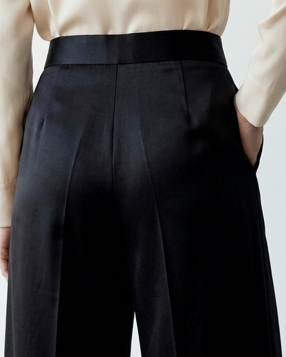 Back view of black culotte pants in rose fabric with relaxed fit Moon N Lotus