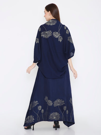 Close-up of floral foil detailing on navy shrug, elegant minimal shine Moon N Lotus