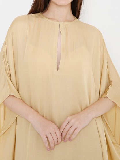Front view of gold kaftan for women, flowy relaxed silhouette Moon N Lotus
