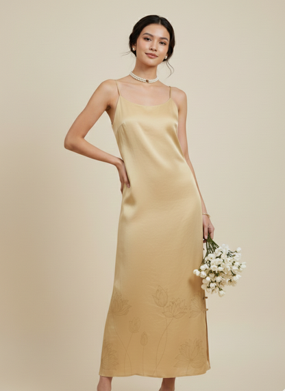 Back view of gold loop dress, relaxed silhouette and fluid fit
