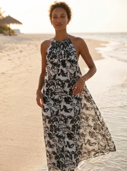Long Hawaiian dress styled for beach and resort wear, effortless summer look