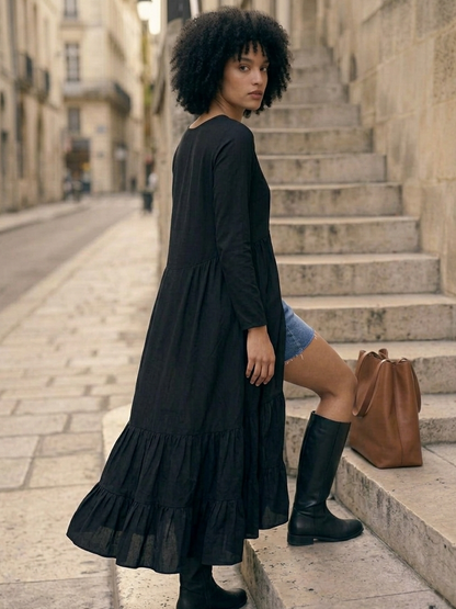 Front view of black high low top with asymmetric hem and clean silhouette Moon N Lotus