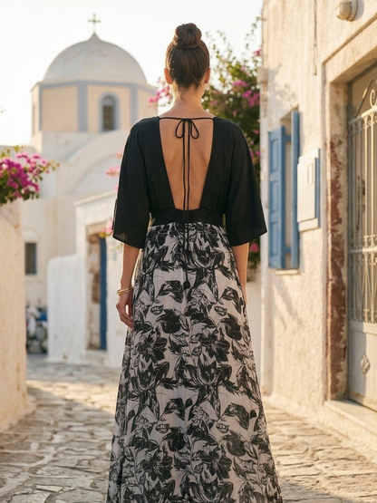 Back view of printed kimono dress in orange fabric with black and grey tones Moon N Lotus