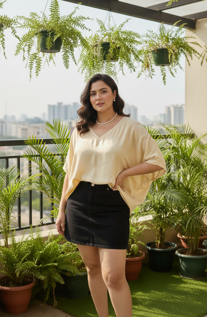 Gold kimono top styled for everyday and resort wear, minimal fashion look