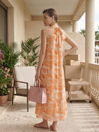 Back view of long Hawaiian dress, relaxed silhouette and flowy fit Moon N Lotus