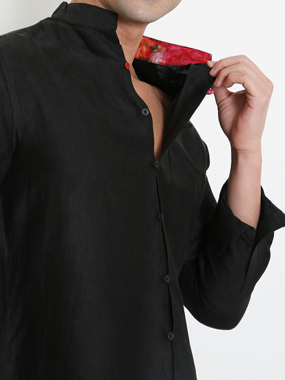 Close-up of mandarin collar on black bamboo shirt, minimal premium design Moon N Lotus