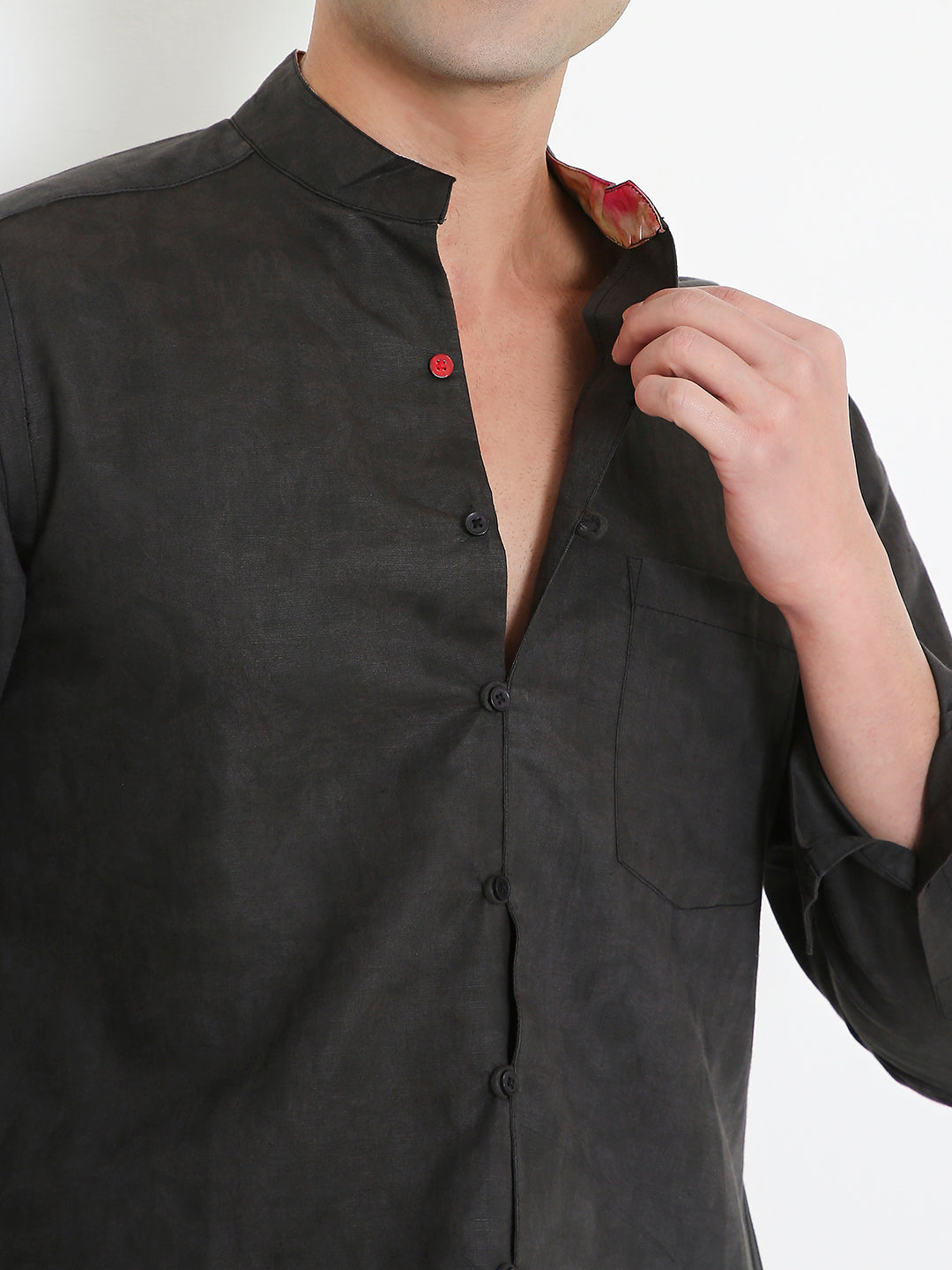 Close-up of mandarin collar on black cotton hemp shirt, minimal premium design Moon N Lotus