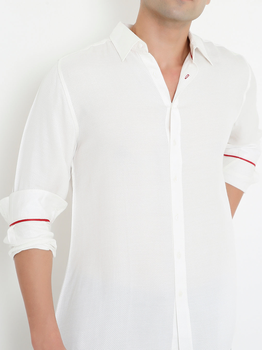 Close-up of orange fabric on white shirt, premium breathable design Moon N Lotus