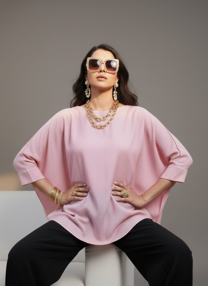 Front view of pink asymmetrical top, flowy minimal silhouette Moon N Lotus