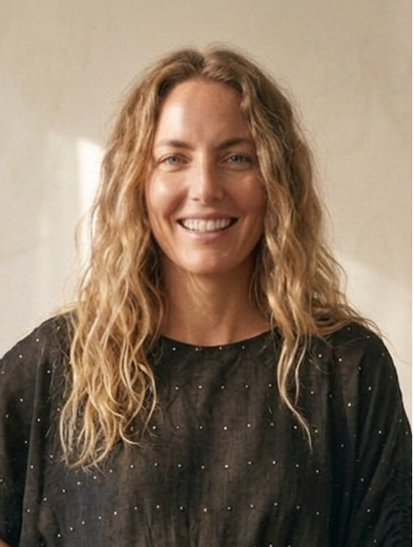 Close-up of polka print on black circle top in rose fabric, breathable lightweight design Moon N Lotus