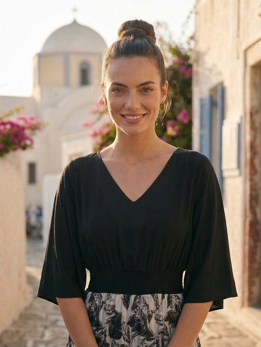 Close-up of black and grey print on orange kimono dress, artistic detailing Moon N Lotus