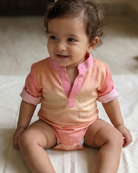 Close-up of sky print on baby romper, soft delicate detailing Moon N Lotus