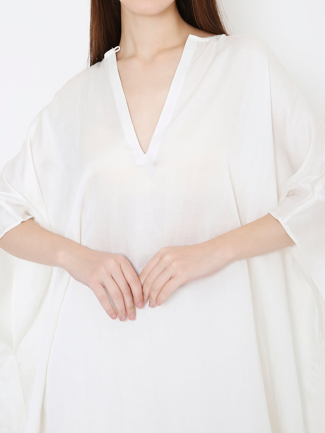 Front view of white kaftan for women, flowy relaxed silhouette bamboo fabric Moon N Lotus
